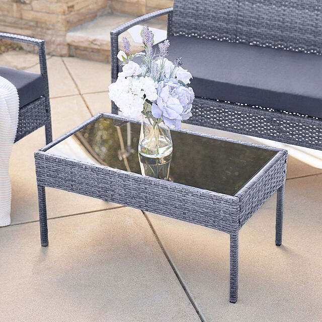 outdoor patio set with glass table